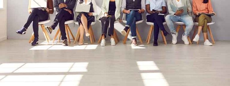 Scrum Master candidate in an interview discussing Agile leadership and team facilitation